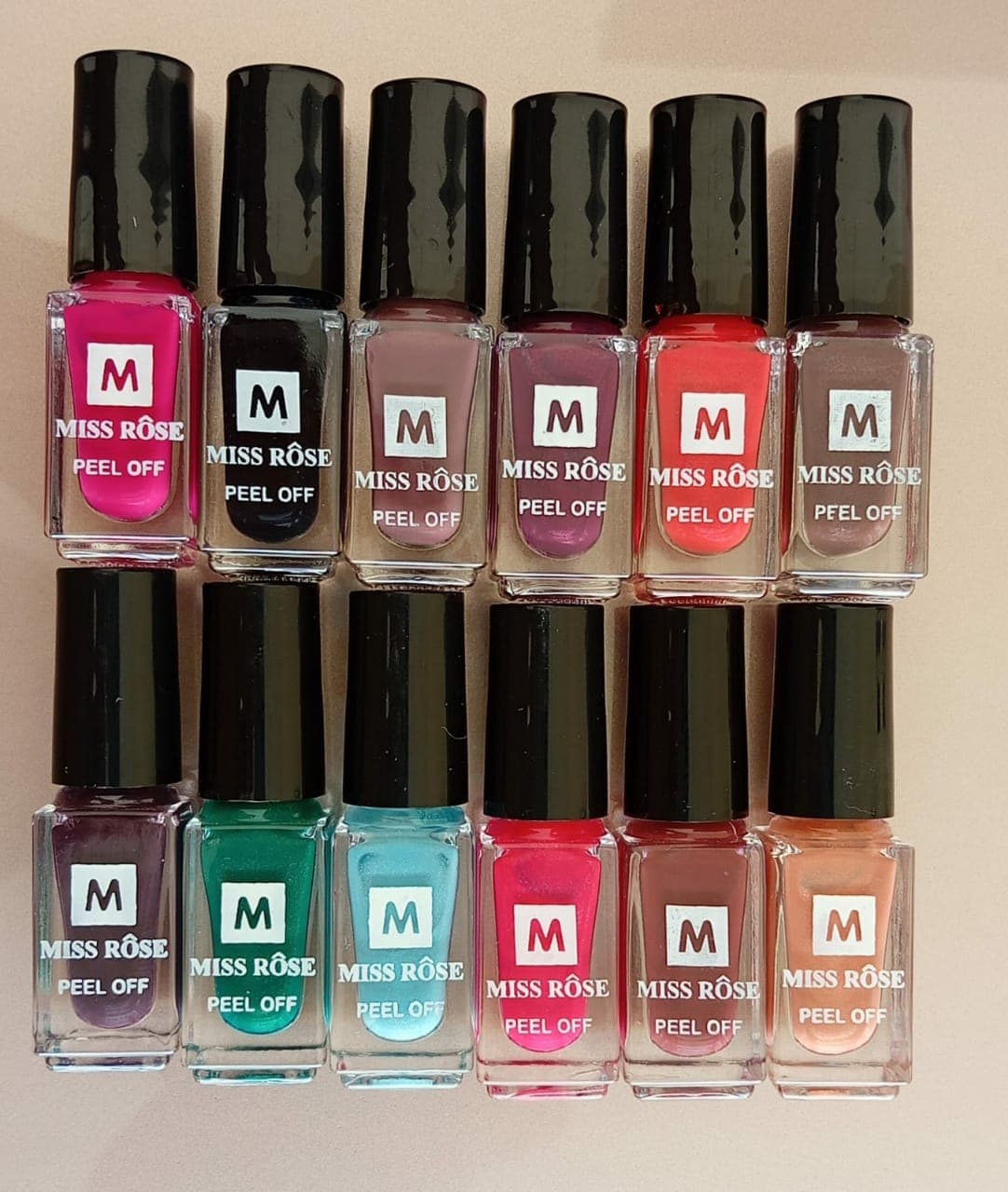 12 Pcs Miss Rose Peel Off Nail Paint Set – Assorted Colors Easy to Apply Nail Polish
